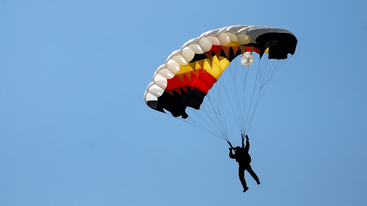 A man with his parachute open